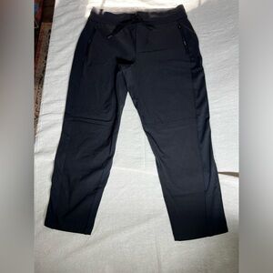 Athleta Headland Hybrid black‎ multi fabric pants with side zippers. size 10.